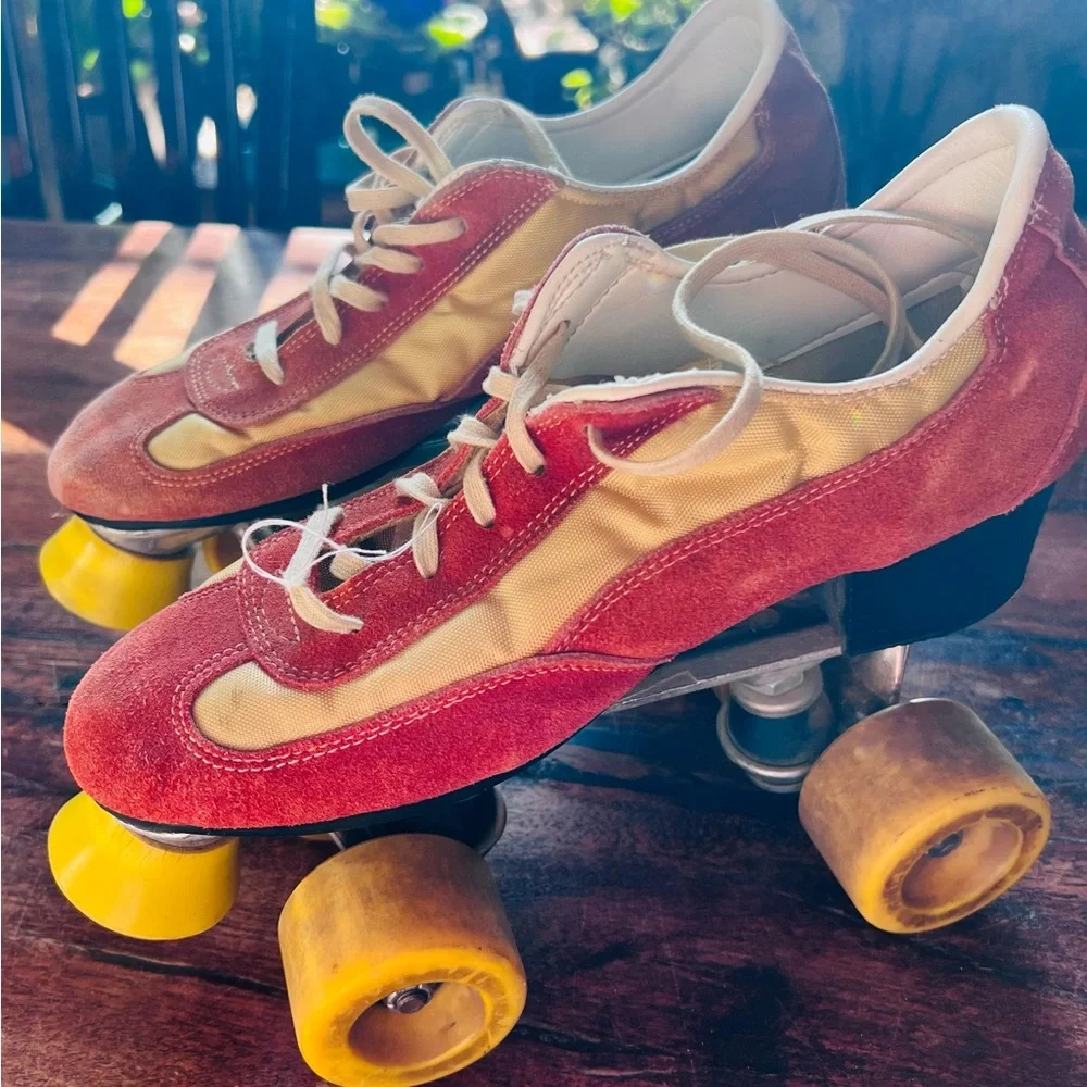 Vintage 1970’s roller derby skates, orange suede and yellow fabric.